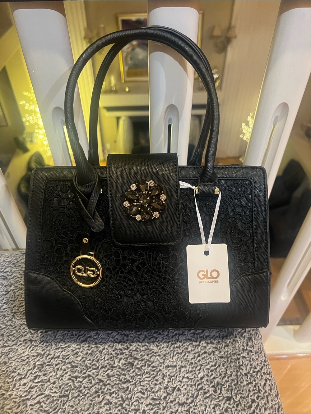 Black satchel Glo handbag with crystal brooch